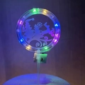 Close-up of LED Christmas cake topper with RGB lights and a clear acrylic surface - Style 6 Multi-color Light