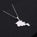 Close-up of silver Armenia map pendant with engraved regional names on black texture - Steel Engraved Style A / Steel