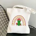 White canvas tote bag featuring a cute frog wearing a mushroom hat and rainbow print - C9-Frog Under Rainbow With Mushroom Hat (No Zipper No Pocket)