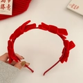 Festive red velvet bow headband with soft fur balls for girls New Year celebration - Red Knot Headband