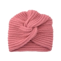 Detail showing the thick knit texture and crossover twist of the pink turban hat - Beige Red