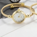 Elegant gold bangle watch for women with a white Roman numeral dial and twisted band - Roman Numerals Gold Band White Dial