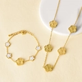 Elegant gold flower jewelry set with white shell inlay necklace and matching bracelet - Necklace + Bracelet