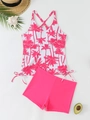 Detail of tropical palm print tankini top with adjustable side drawstrings and cross straps - S / Pink