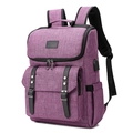 Detail view of purple laptop backpack showing integrated USB charging port and side pocket - Purple