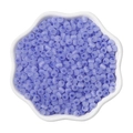 Round purple cat eye glass beads for handmade jewelry making in a white bowl - Sapphire Blue
