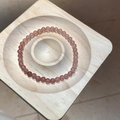 Close-up of pink strawberry quartz beaded bracelet on a premium wooden display stand - 31# Bracelet (4mm/Box)