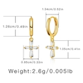 Gold-plated cross charm earrings with clear zircon stones on a white background - Cross Zircon (KEAM0116)