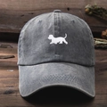 Close-up of white puppy embroidery on a vintage washed grey cotton baseball cap - One Size / Gray