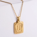 Detail of 18K gold plated stainless steel rectangle pendant with embossed letter U - Letter U