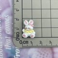 Mini resin cartoon rabbit charm on scale mat measuring 1.5cm for DIY crafts - White Waving Rabbit