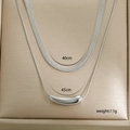 Collana a doppio strato in argento con catena a serpente piatta e ciondolo curvo lucido - Doppio Strato Cilindro Argento