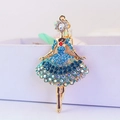 Sprankelende ballerina sleutelhanger met blauwe en groene strass op gouden legering - Blauw