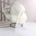 Elegant white straw sun hat for women featuring a delicate lace bow and wide brim - Lace Bow Straw Hat Milk White