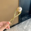 Elegant gold alloy hair clip featuring a white pearl accent for sophisticated styling - Single Pearl Twist Clip - Gold