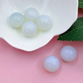 Set of seven light blue 16mm natural crystal spheres for feng shui decoration - Opalite