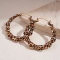 Golden leopard print bamboo-textured hoop earrings with vintage geometric aesthetic - Gold Ear Buckle (Leopard Print)