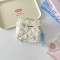Detail of quilted elephant pattern pouch with Sozakka label and blue rope handle - Bowknot Elephant