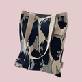Cartoon knit tote bag featuring abstract camouflage pattern in beige, navy and grey - Black Beige Grey Stone