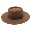 Detailed view of the woven texture and dark brown ribbon on the flat top boater hat - Brown