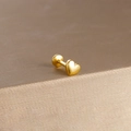 Detailed view of gold heart flat back stud in polished stainless steel for lip or ear piercing - Gold Classic Heart Shape