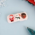 Detail der flauschigen rosa Haarklammer mit Weihnachtsmann, Schneemann und Rentier Motiven - BB-Haarclips / Rosa