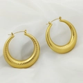 Macro detail of thick gold hoop earrings featuring elegant spiral texture on white fabric - Thick Spiral Hoop Style (XL1464-66)