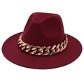 Detail of burgundy wool fedora featuring a thick metallic rose gold acrylic chain - Burgundy