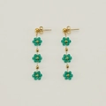 Bohemian gold-tone drop earrings featuring three stacked green beaded floral charms - Green (Earrings)
