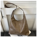 Brown leather moon-shaped hobo shoulder bag with an adjustable strap in urban style - Khaki