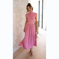 Sleeveless pink midi dress with high neck and waist cut-outs in modern indoor setting - Pink