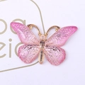 Macro detail of pink translucent resin butterfly pendant with gold metallic edges - 6 Pink