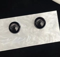Minimalist glossy black round pearl studs with silver pins on a marble display - 32# Black Pearl Stud Earrings (12mm)