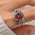 Luxury silver ring with large round red zircon and side diamonds on female finger - Adjustable Open / 5 Carat Red Center Stone Wave Pattern Style(XSD-17)