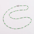 Delicate silver titanium steel necklace featuring vibrant green enamel lip charms - Steel + Grass Green Enamel