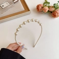 Elegant white faux pearl headband featuring graduated beads for a French hair styling look - Spaced Pearl Style / White