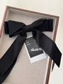 Large black satin bow hair clip with long ribbons in a premium wooden display tray - Vintage Black