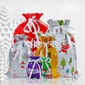 Assorted colorful drawstring Christmas gift bags with Santa and reindeer festive prints - Mixed Christmas Gift Bag Set
