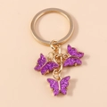 Acrylic butterfly keychain with purple glitter charms and golden keyring clasp - Deep Purple Glitter (YZ172shenzi)