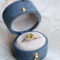 Adjustable gold ring with round green gemstone in a premium blue velvet jewelry box - Gold Peridot Green Bezel Ring