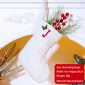 White knitted Christmas stocking with letter J embroidery and holly leaf pattern - Letter J / White