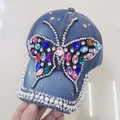 Denim baseball cap with colorful rhinestone butterfly and pearl-studded brim - Adult Size (Adjustable) / Blue Denim