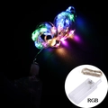 Macro shot of RGB copper wire fairy lights with cork battery box for DIY bottle decor - Colorful Light String / Colorful