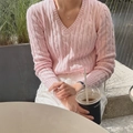 Pink V-neck cable knit sweater for women styled with white pants in casual outdoor setting - S / Pink