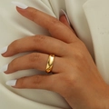 Close-up of minimalist leaf 18k gold steel ring on model finger with white nails - US 6 / Smooth Simple Ring