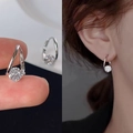 Macro detail of silver circle earrings with clear zircon stones and model wearing shot - U-Shaped Round Zirconia Design (E1677 Silver) / 925 Silver Needle / Silver