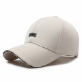 Beige adjustable baseball cap featuring FEWK embroidery patch and lettered brim edges - Adjustable / Beige