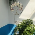 Detail of tree of life suncatcher with crystal prism ball and metal butterfly ornament - Rainbow Fluorite