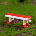 Miniatuur kerstbankje met kerstmanbenen voor kerstdecoratie in microlandschap - Kerst Rode Bank / Rode Bank
