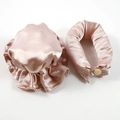 Close-up of pink silk hair bun maker set and matching elastic sleep cap on white background - Champagne Pink